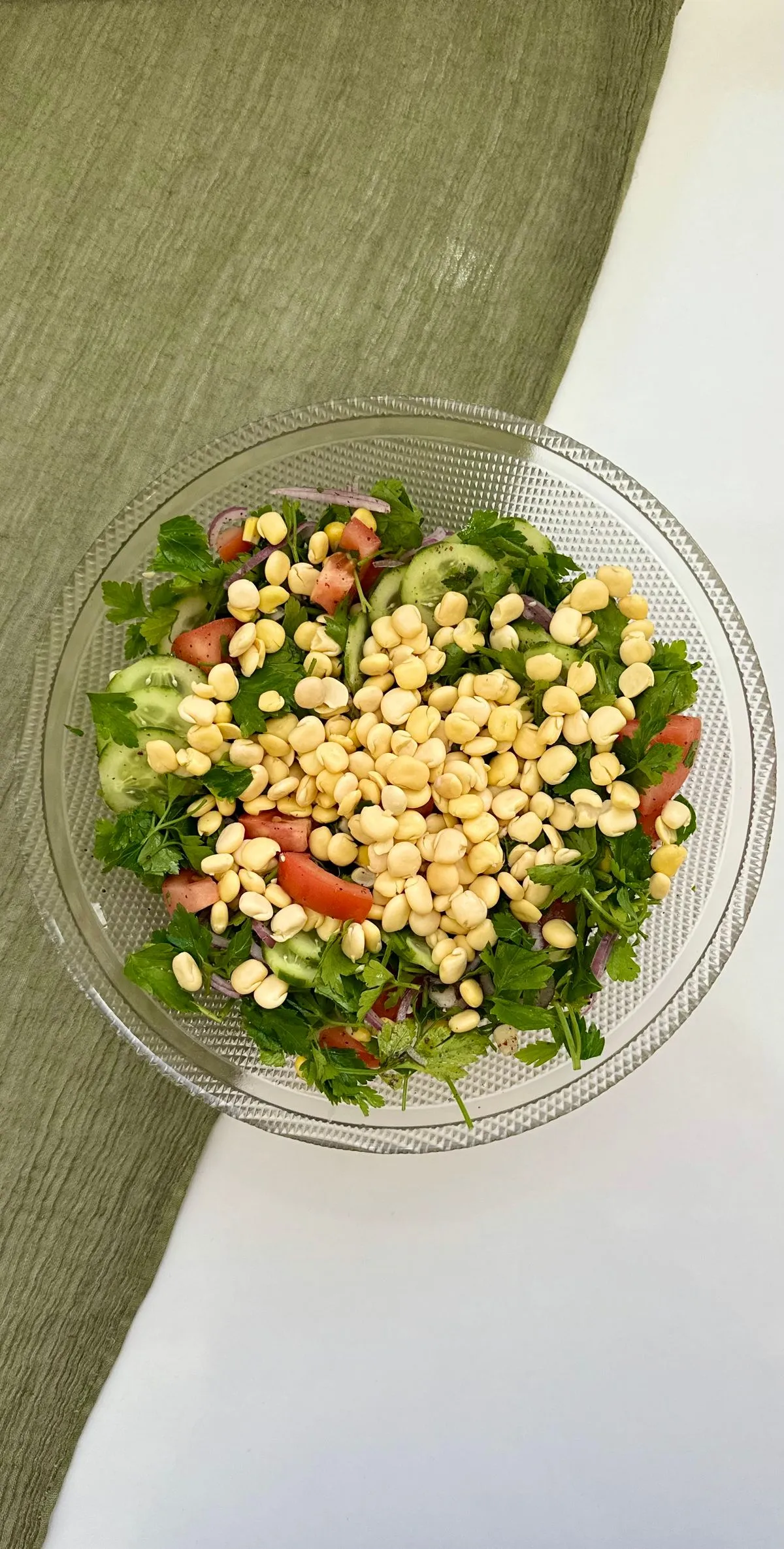 Bean and vegetable salad in a glass bowl