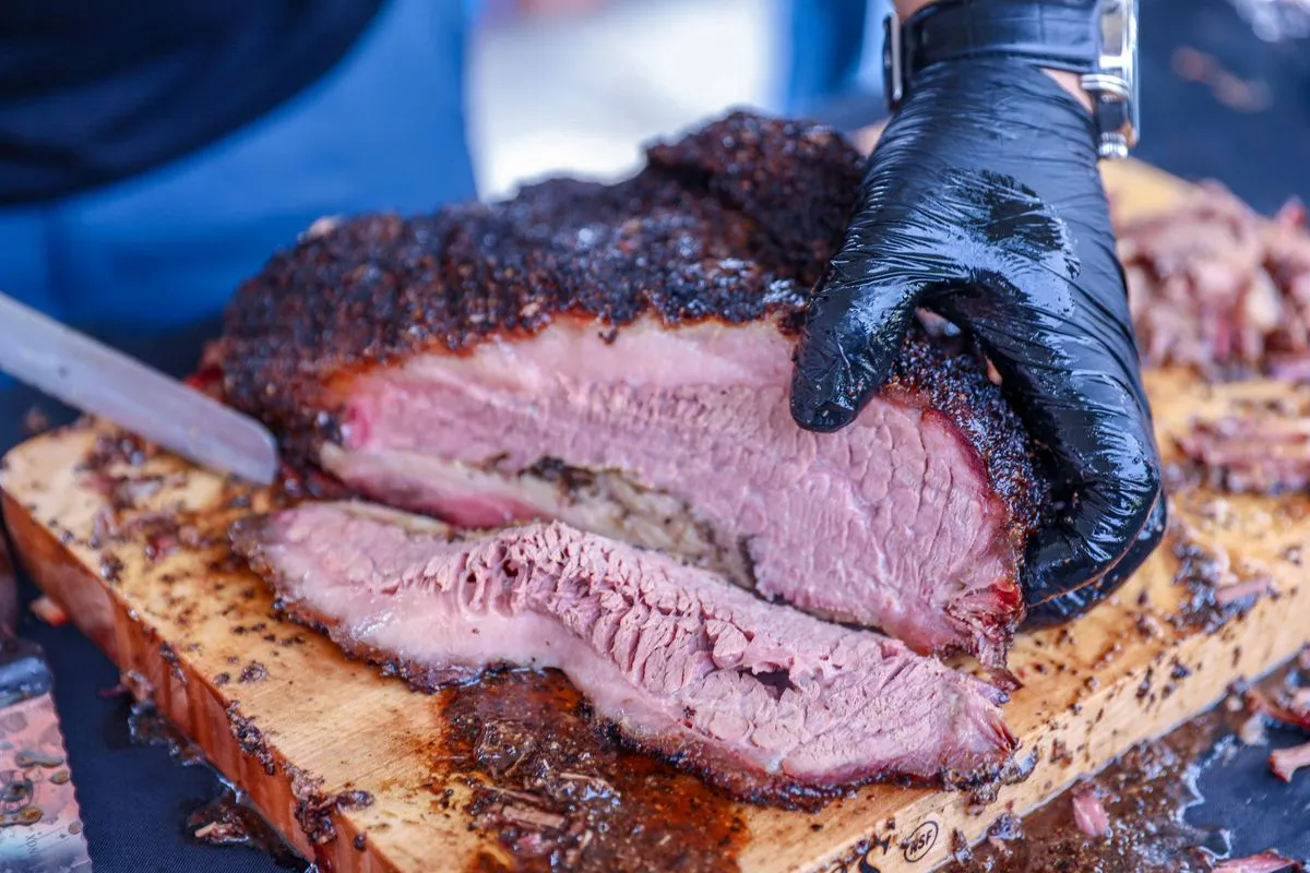 Slicing a cooked barbecue brisket