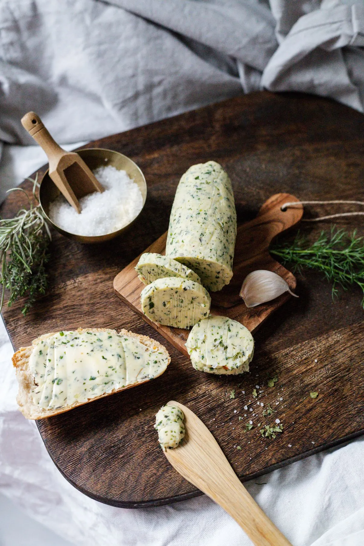 Herb butter spread on rustic bread