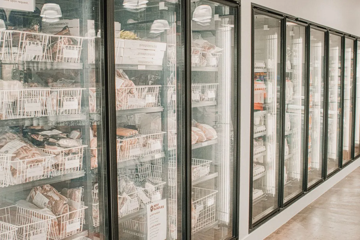 Packaged frozen meat in a freezer
