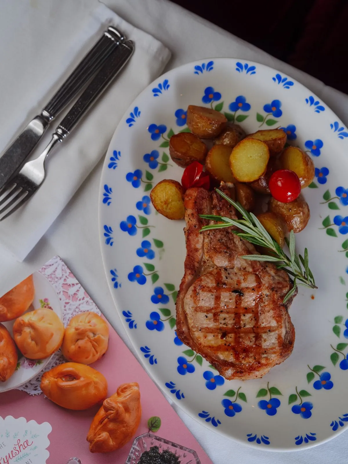 Pork chop with potatoes and rosemary