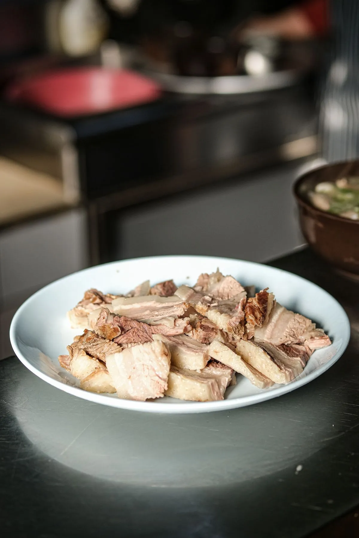 Pulled pork served on a white plate