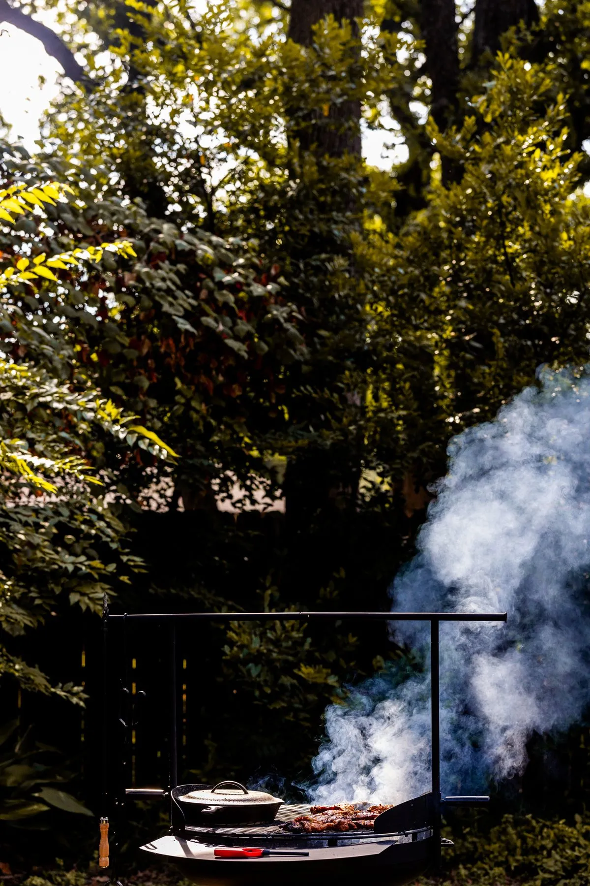 A smoking barbecue in a garden