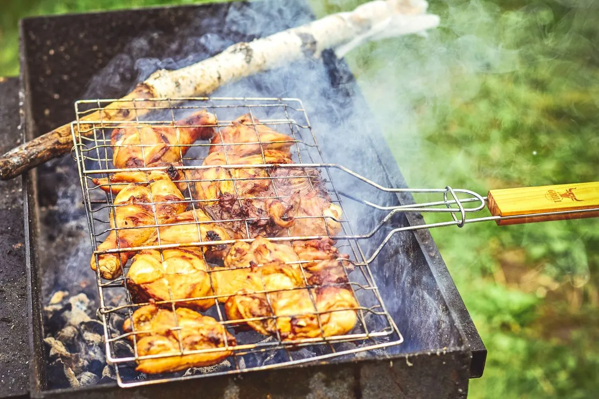 Chicken cooking on a barbecue