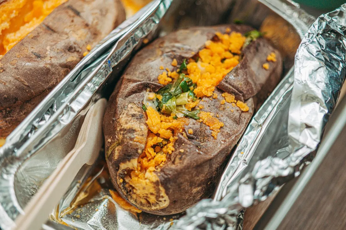 A cooked sweet potato served whole