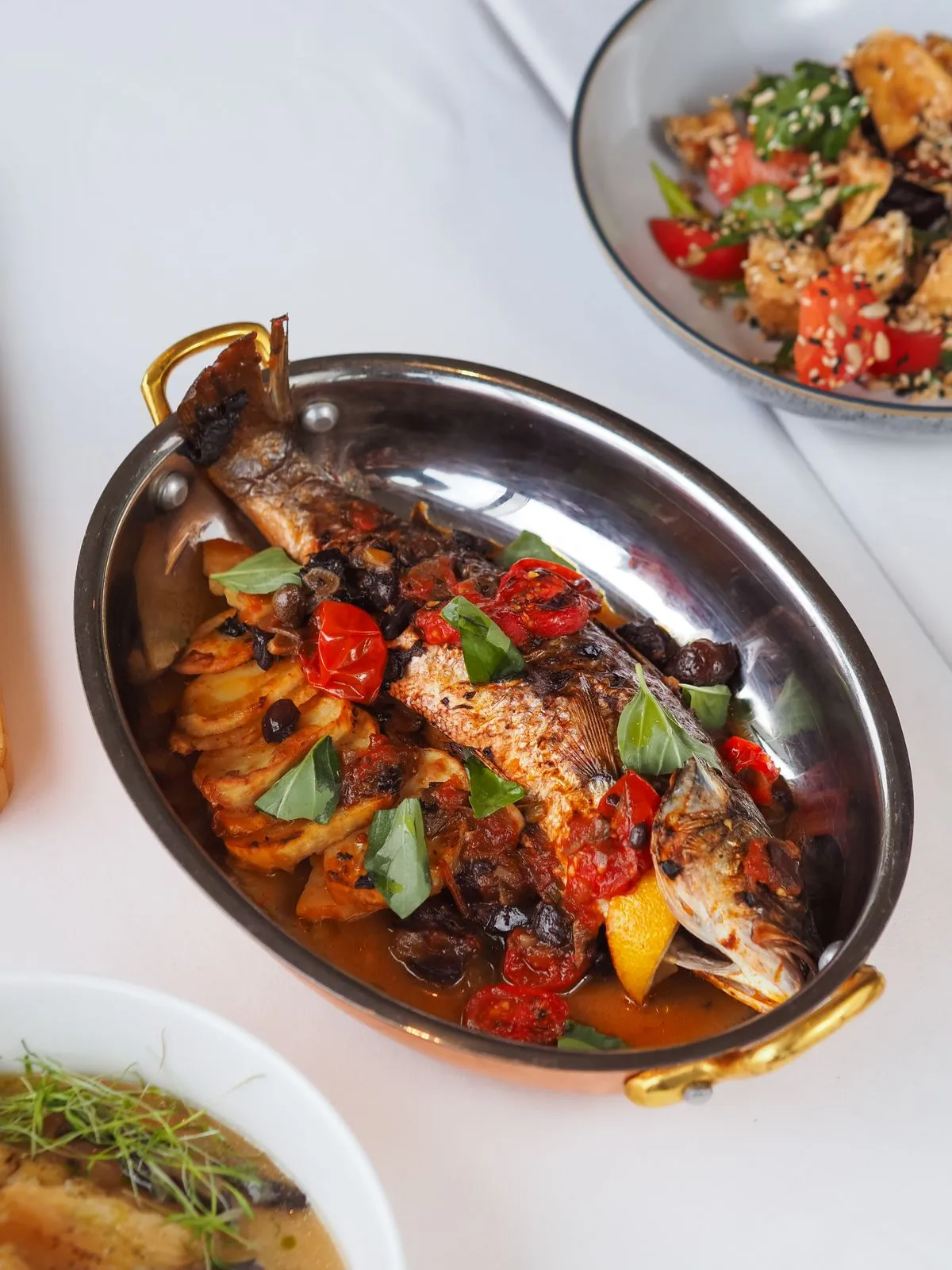 Whole trout with vegetables